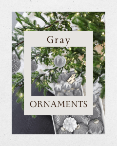  Grey Christmas Ornaments displayed on a tree